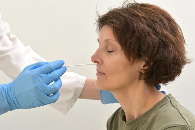 Doctor examining patient at clinic