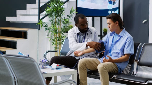 Doctor examining patient in office