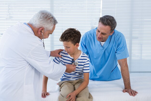 Doctor examining the patient