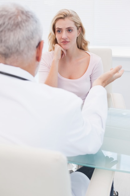 Doctor explaining at his patient 