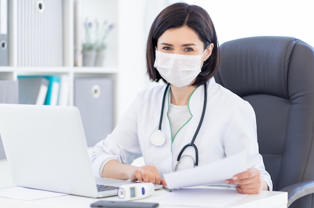 doctor in face mask at work