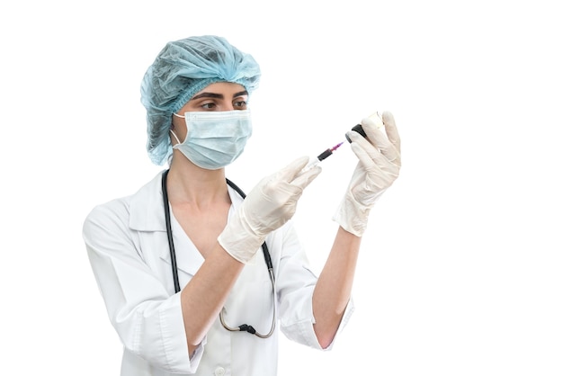 Doctor filling syringe with medications from ampule isolated on white