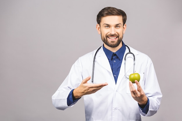 Doctor giving apple concept for healthy eating and lifestyle or good diet