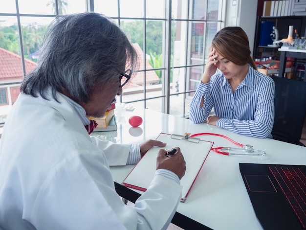 Doctor giving a consultation to a patient in hospital