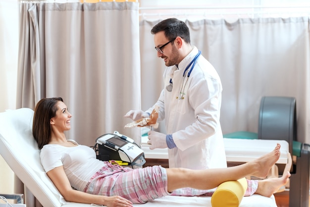 Doctor helping his patient.