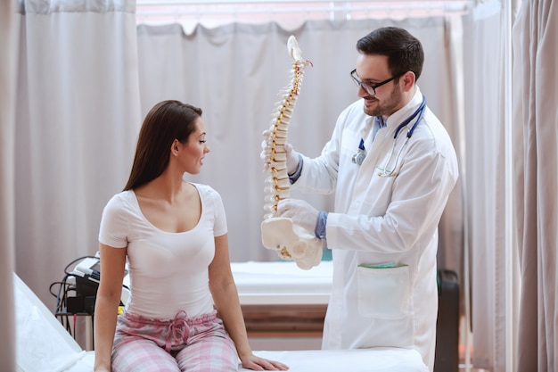 Doctor helping his patient.