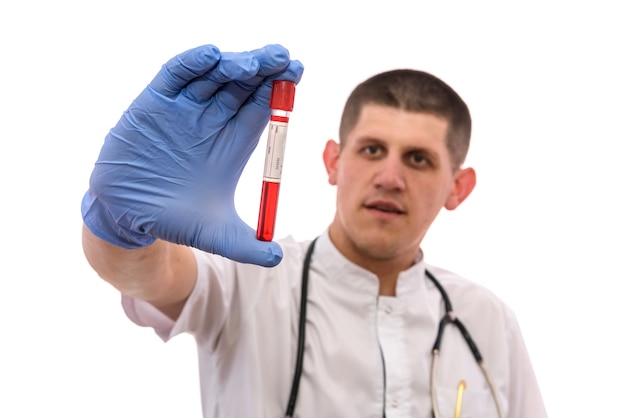 Photo doctor holding blood test tube isolated on white background. examine blood tube.