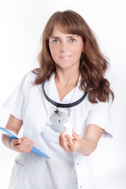 Doctor holding a bottle of pills