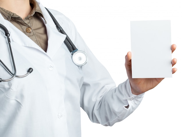 Photo doctor holding card with stethoscope isolated