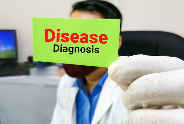 Doctor holding card with text Disease Diagnosis