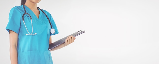 Doctor holding a clipboard with prescription