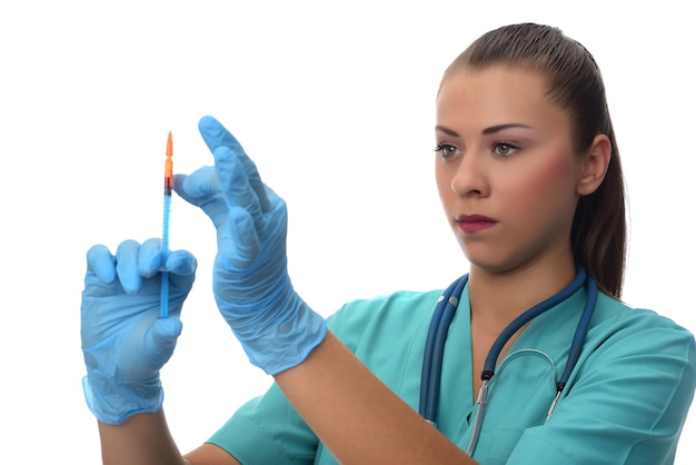 Doctor holding coronavirus vaccine. Covid-19 Vaccination. Stop quarantine. Close-up syringe