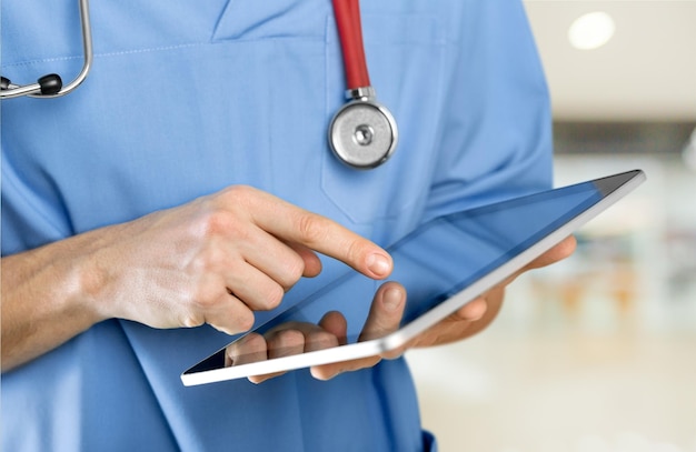 doctor holding digital tablet