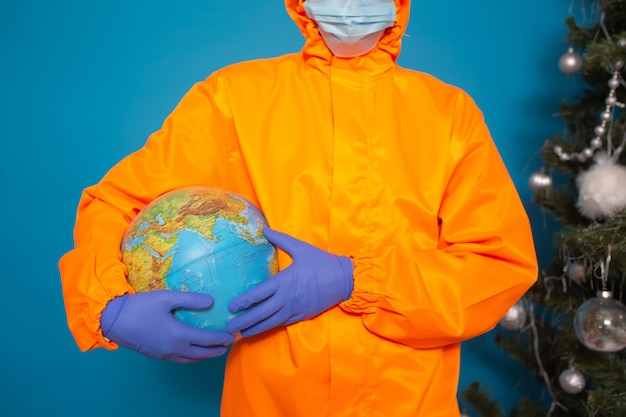 Doctor holding earth globe