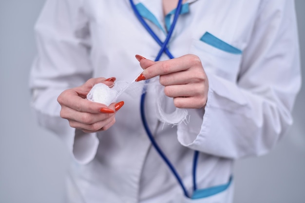 Doctor holding hands bandages in the Cabinet