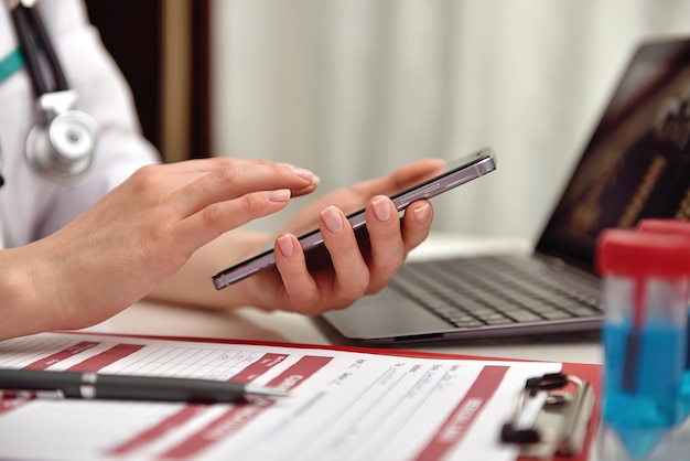 Doctor holding phone