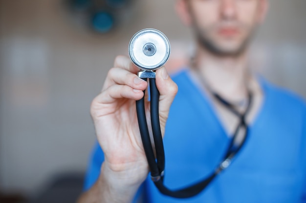 Doctor holding a Phonendoscope in his hand