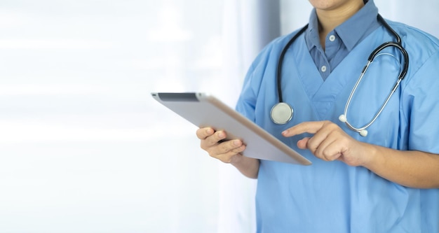 Doctor holding tablet healthcare and medicine concept doctor\
nurse