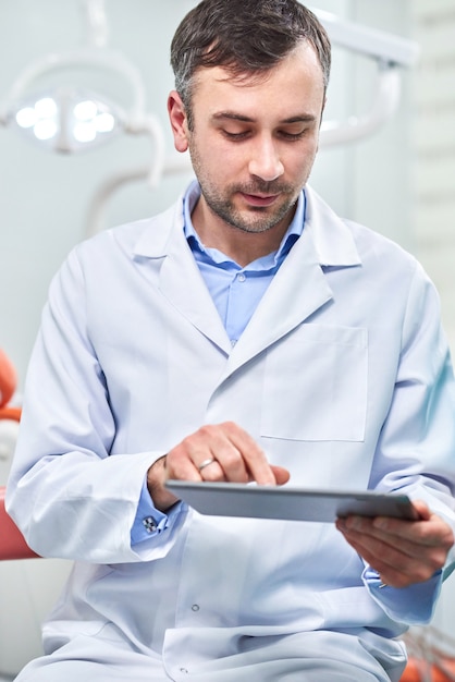 Doctor holding tablet