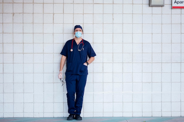 Doctor in hospital outside resting