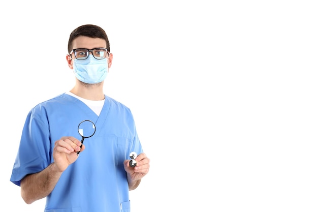 Doctor intern with magnifier and lenses isolated on white background