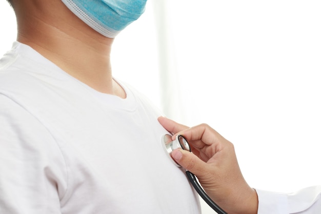 Doctor is checking heart wave with patient at hospital