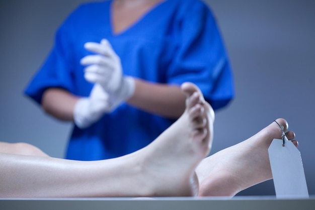 A doctor is getting a foot massage from a patient.