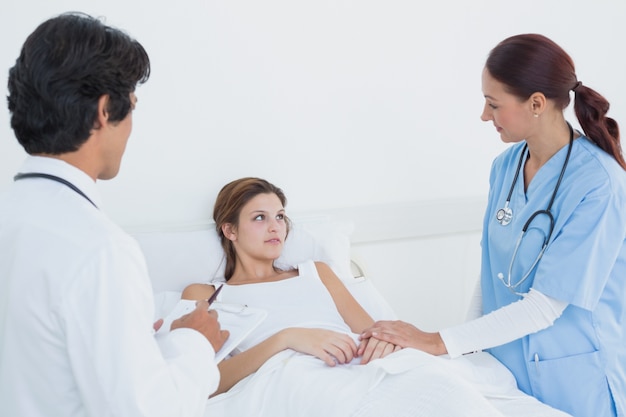 Doctor looking after his patient