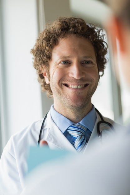 Doctor looking at colleague