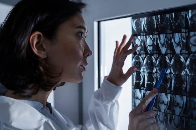 Photo doctor looking over ct scan