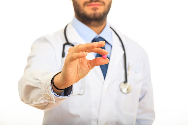 Doctor offering a pill