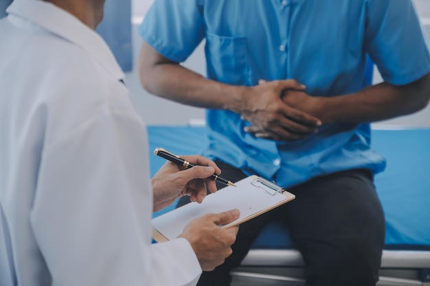 Doctor and patient discussing perfect health exam results Friendly physician is explaining something to young woman Medicine concept