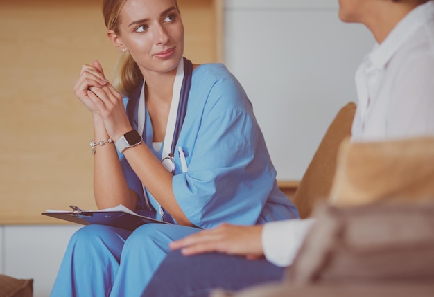 Doctor and patient discussing scan results in diagnostic center