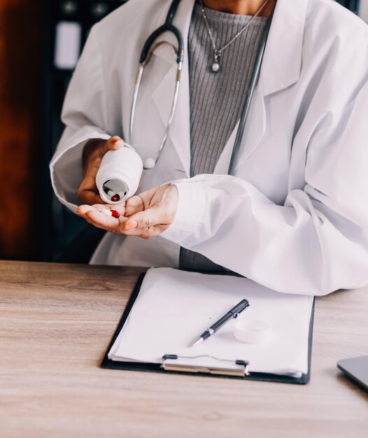 Doctor presenting with patient and checking results on report and prescription about the problem of illness and recommend using medicine healthcare and medical concept