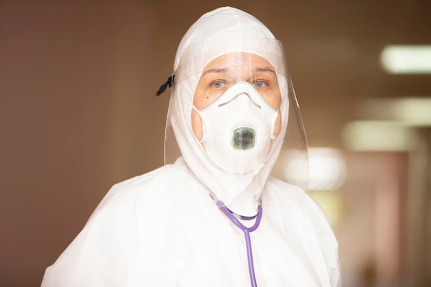 A doctor in a protective suit during an epidemic pandemic coronavirus