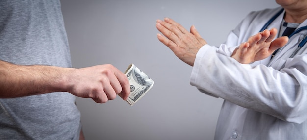 Doctor refusing a bribe Corruption in medicine