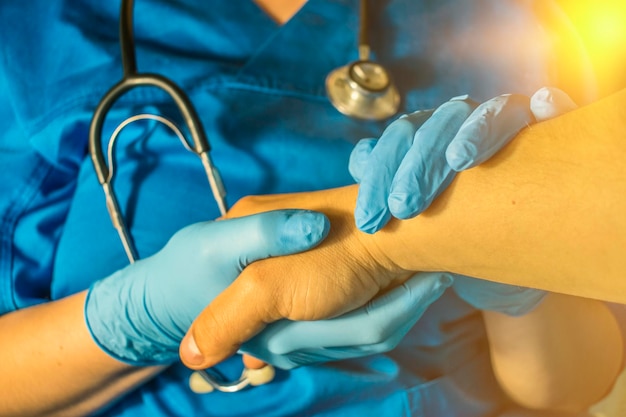 Doctor's gloved hand comforting cancer patient, cancer gene DNA research, cancer early detection