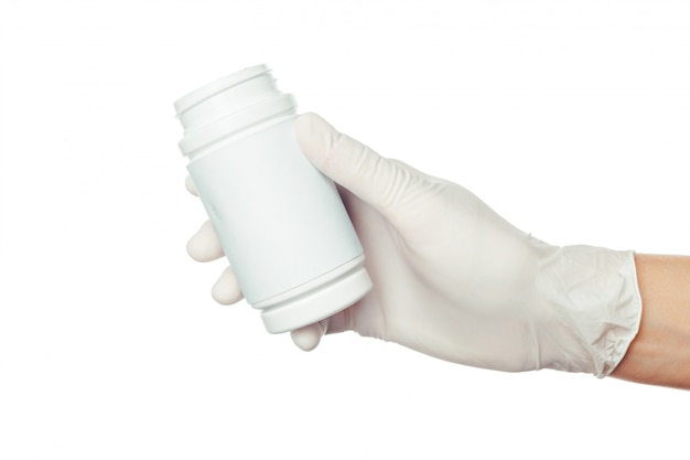 Doctor's hand in witte gesteriliseerde chirurgische handschoen bedrijf geneeskunde