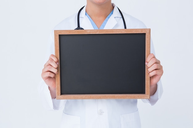 Photo doctor showing little blackboard