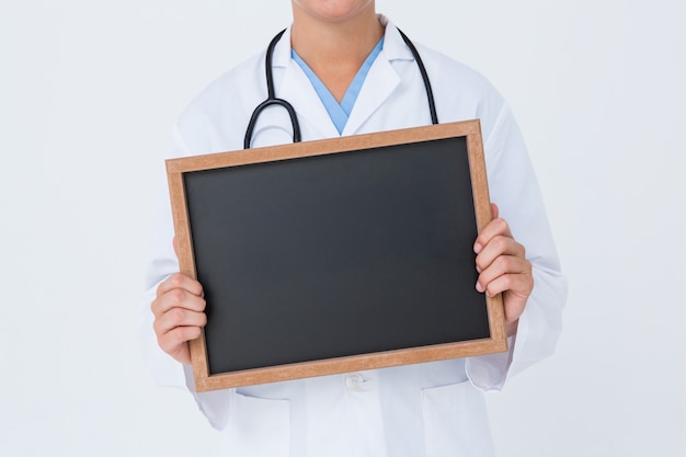 Doctor showing little blackboard