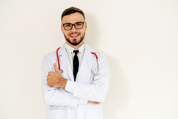 Doctor showing thumbs up on white background.