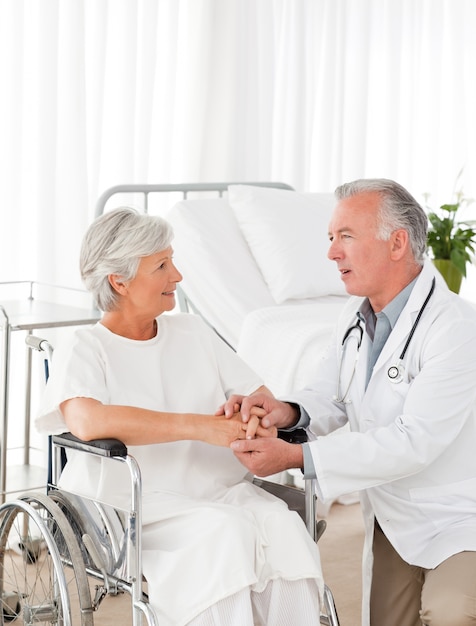 Doctor speaking with his patient