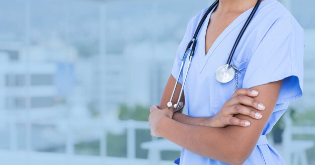 Doctor standing with arms crossed