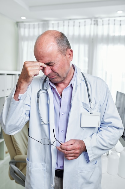 Doctor suffering from headache