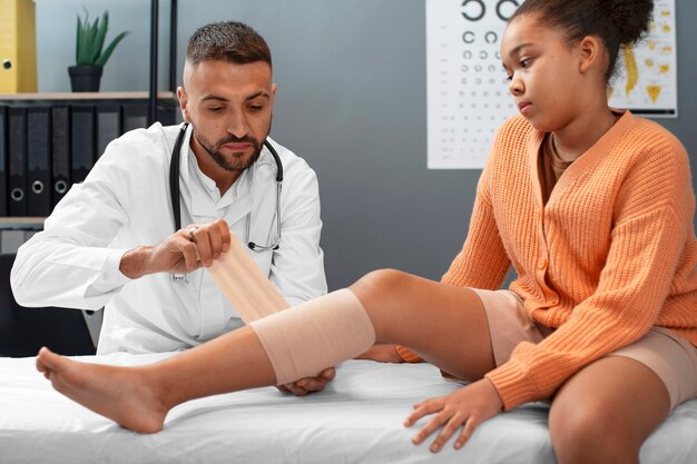 Doctor taking care of afro-american child