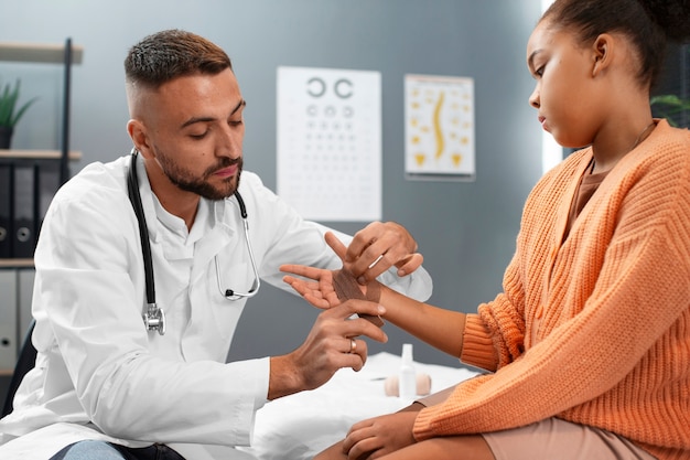 doctor taking care of afro-american child