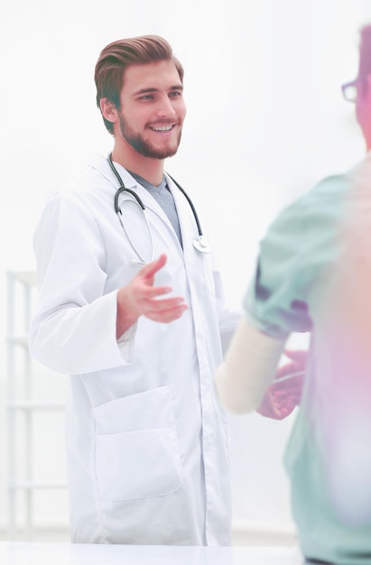 Doctor talking with a patient in a medical office