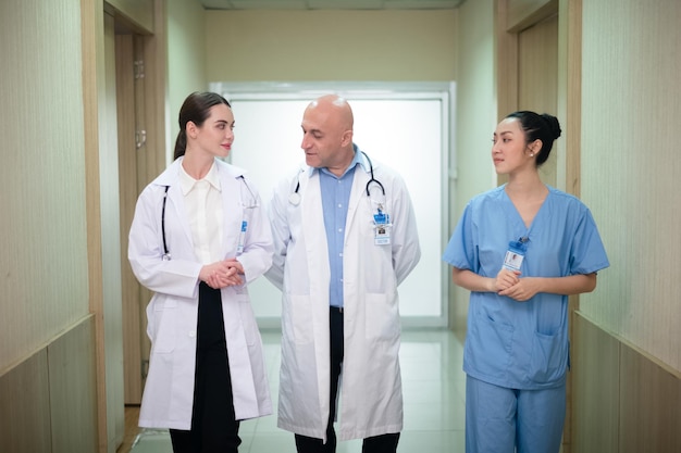 Doctor training nurse student at hospital