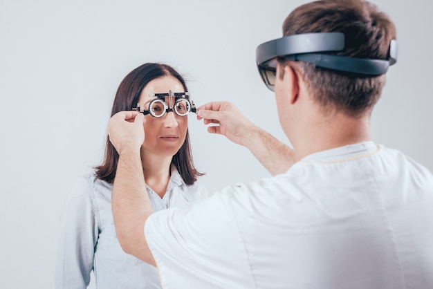 The doctor uses augmented reality glasses in ophthalmology.