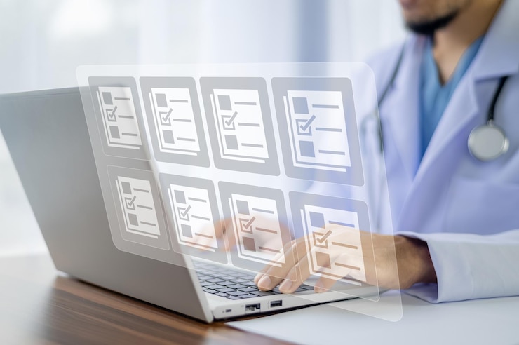 Photo doctor using computer document management system dms online documentation database process automation to efficiently manage files